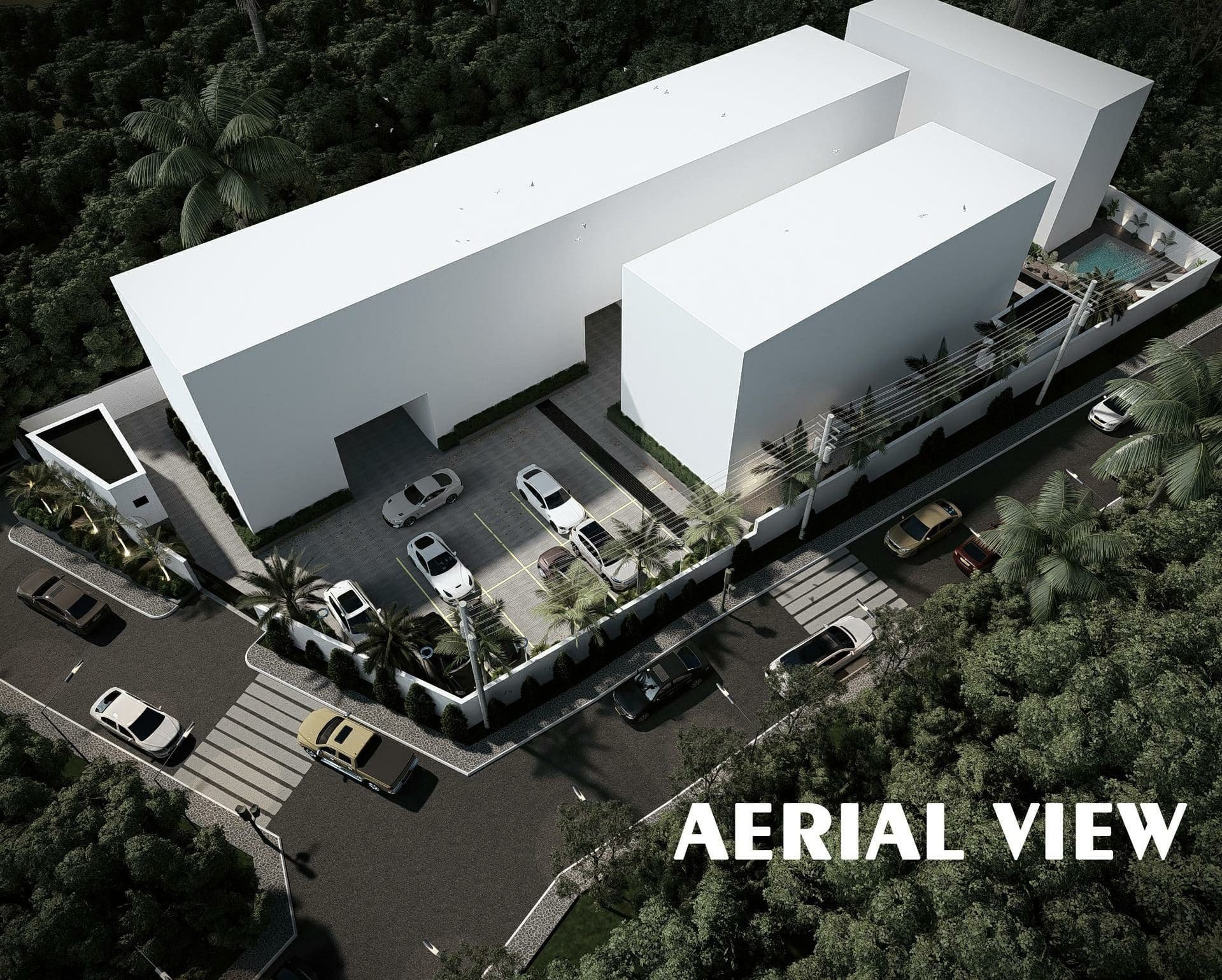 Angled aerial view of Ewang Estate showing the walled perimeter enclosing the terrace row, apartment blocks, parking court and pool terrace.